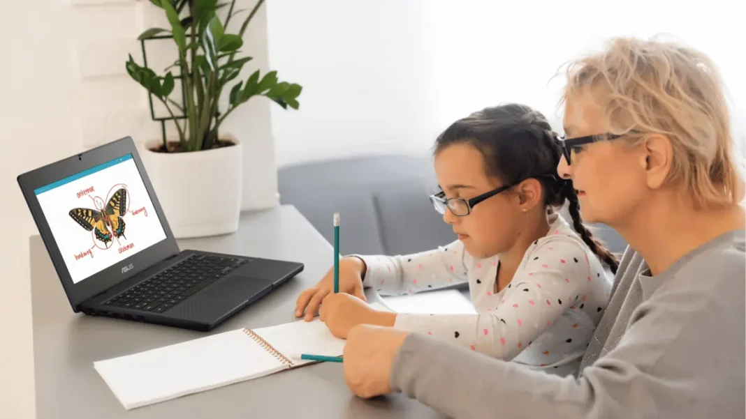ASUS Chromebook CZ series convertible laptop with 360-degree hinge and USI stylus on classroom desk, powered by MediaTek Kompanio 540